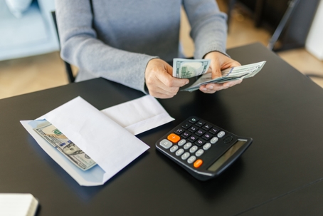 person counting money
